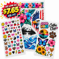 Three sheets of temporary tattoos displayed on a white background, featuring tropical hibiscus flowers, an American flag, ocean waves, a bald eagle, smiley faces, butterflies, flowers, and 'Good Vibes Coffee Club' graphics. A promotional badge in the top left corner reads 'AS LOW AS $7.